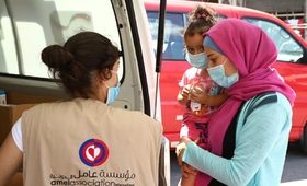 Beirut residents receive support from a mobile medical unit run by Amel Association, with support from UNFPA. © UNFPA Lebanon