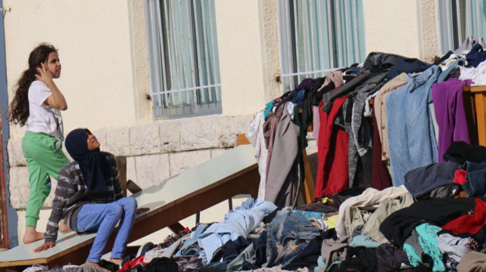 Adolescent girls take shelter at a public school in Mount Lebanon after fleeing their homes from the south following escalation of hostilities across the country